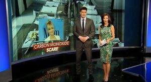 News anchors talking with background image of woman and words "carbon monoxide scare"